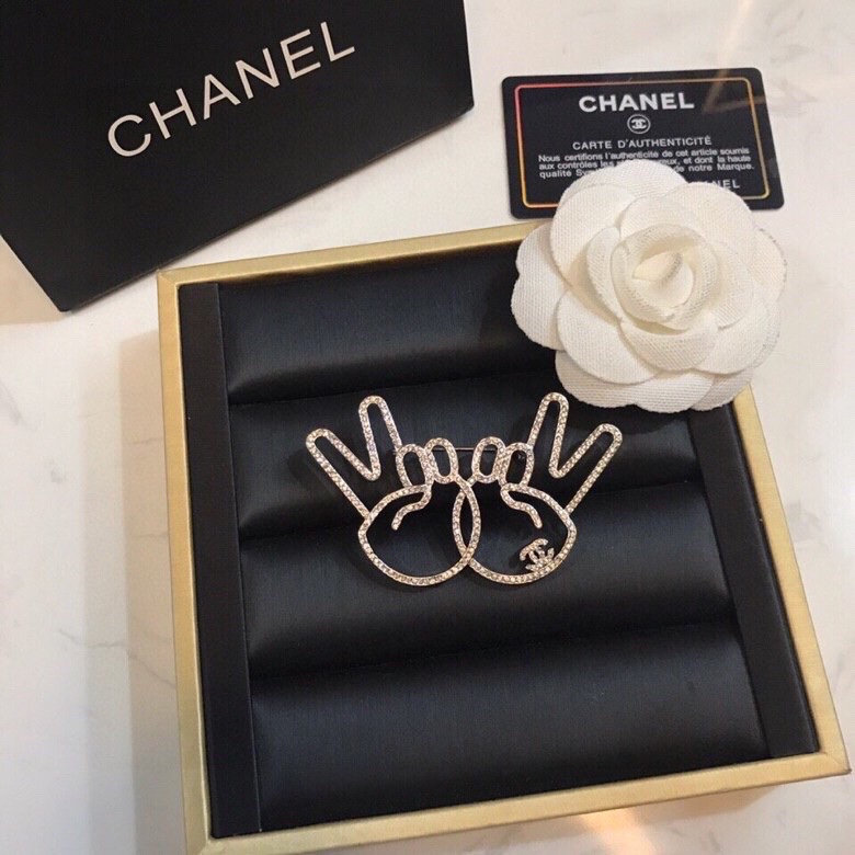 Ch*el brooches